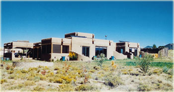 solar collectors screened behind parapet walls in Santa Fe, New Mexico