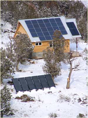 PV roof mounted solar electric collectors and ground mounted solar thermal collectors
