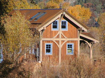 Timber frame utlizing local wood & recycled denim insulation