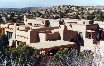 Adobe, wood frame, and fired brick residence in northern New Mexico