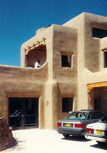 Two story adobe residence in northern New Mexico