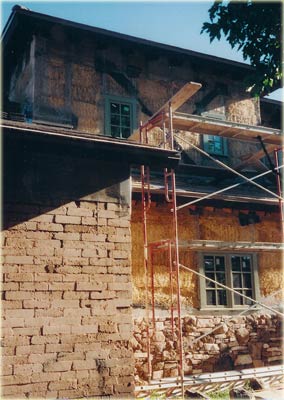 Natural hybrid pressed adobe and strawbale residence