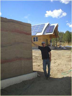 Greg Madeen-Architect w/ alternative rammed earth 